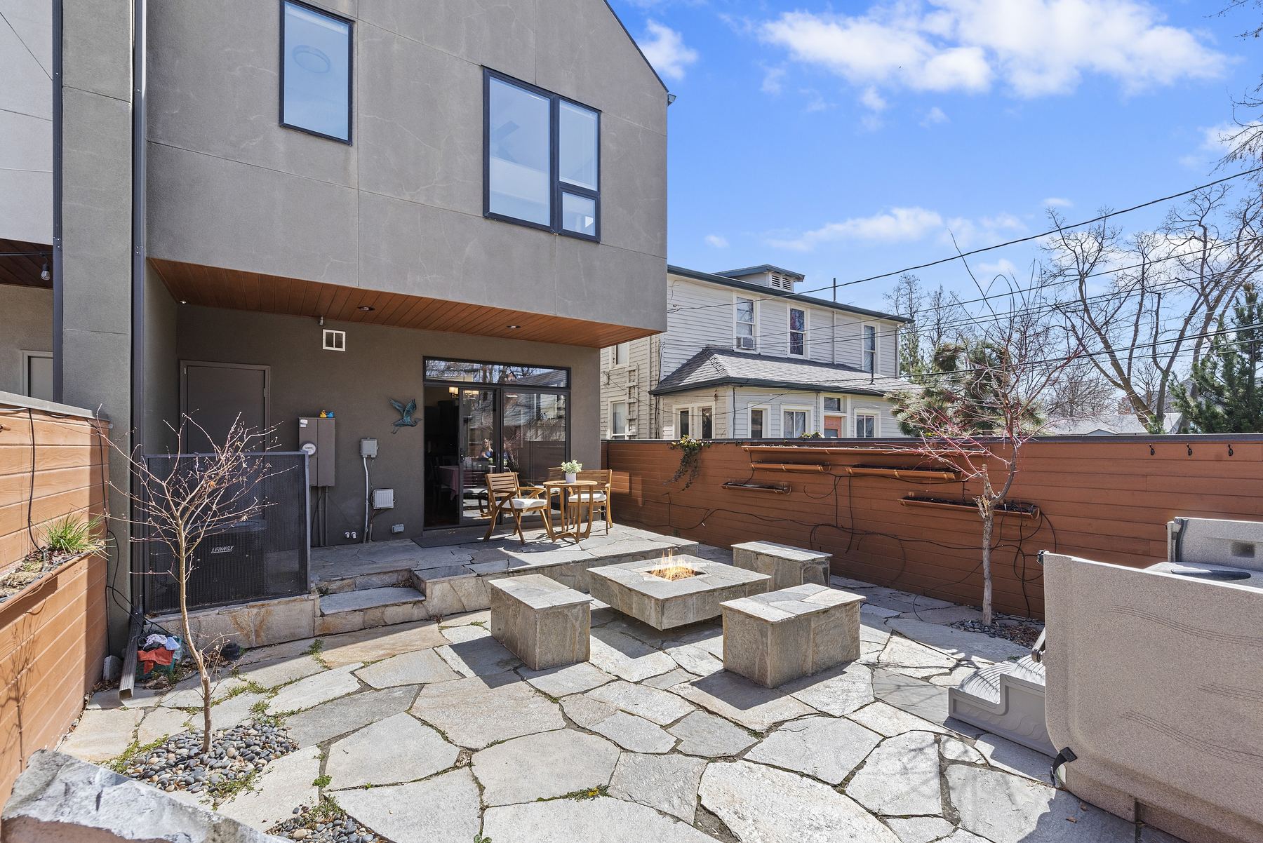 Private courtyard seating and string lights at a Boise vacation rental near Hyde Park