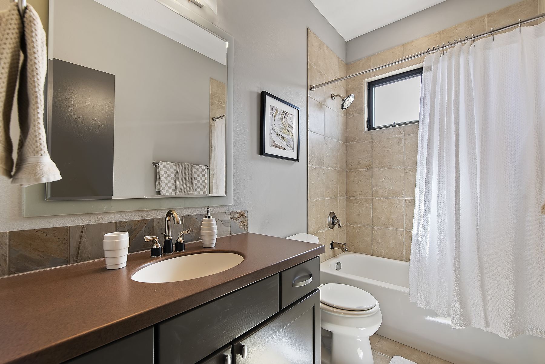 Second full bathroom with tub and shower at a Boise North End vacation rental