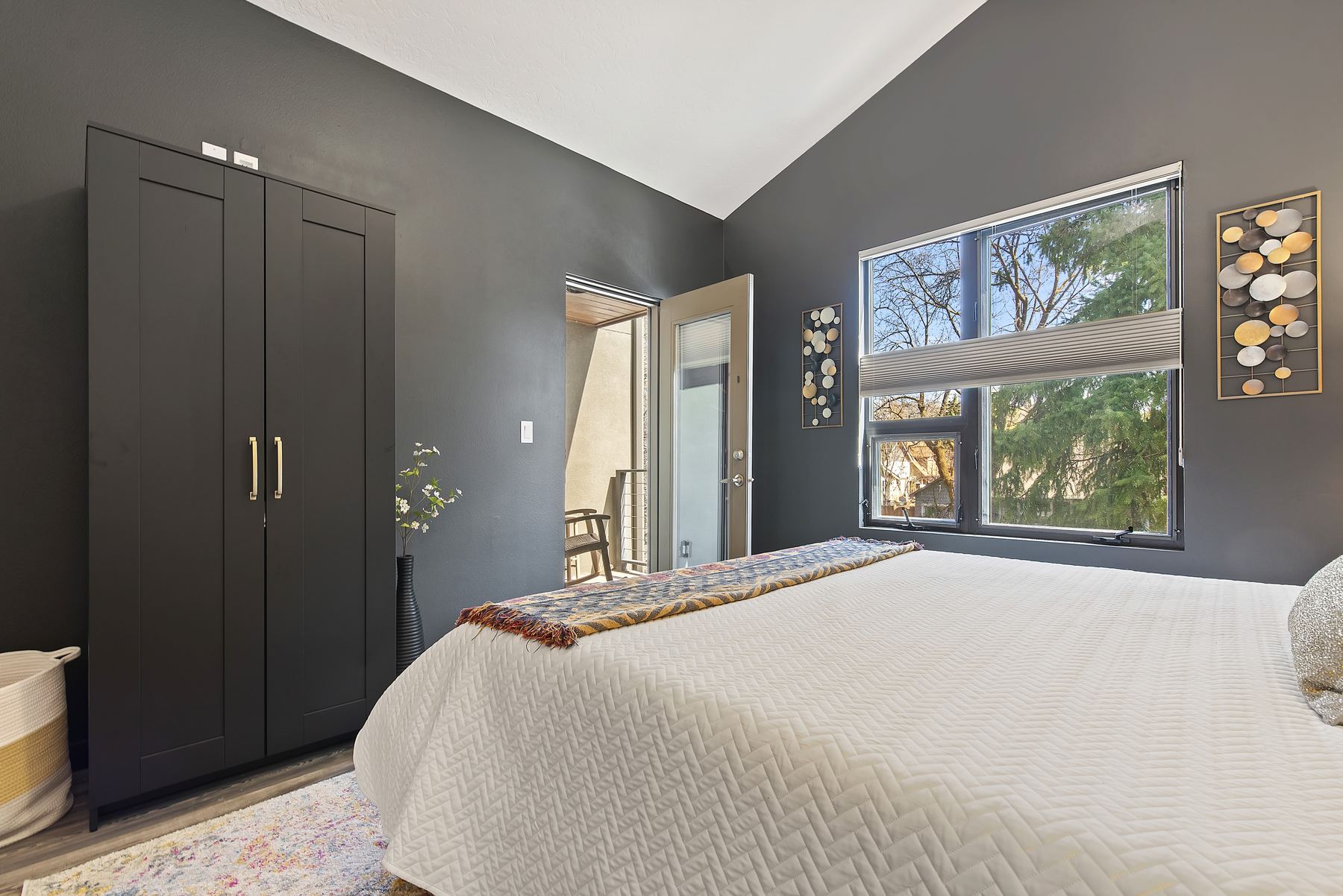 Bedroom with wardrobe and natural light at a Boise North End vacation rental