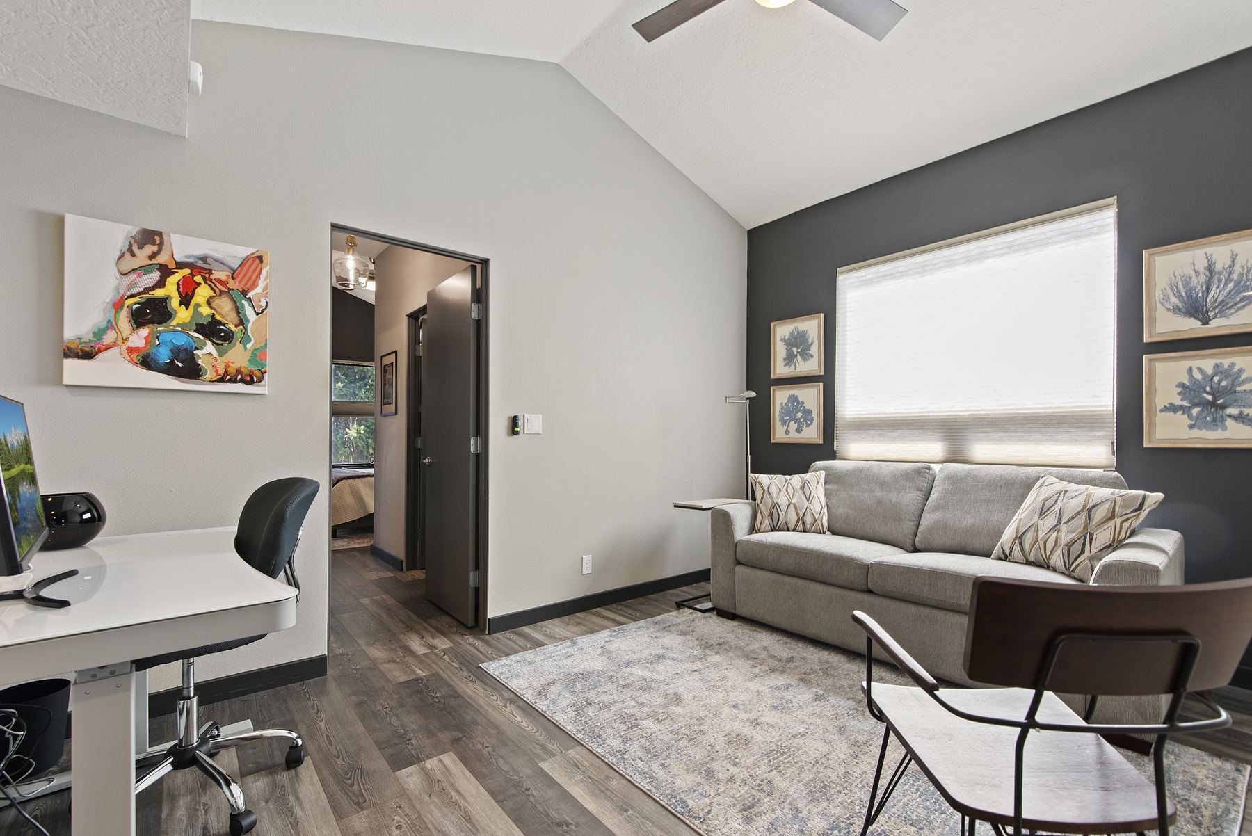 Den with sleeper sofa and desk, third sleeping space at a Boise vacation rental