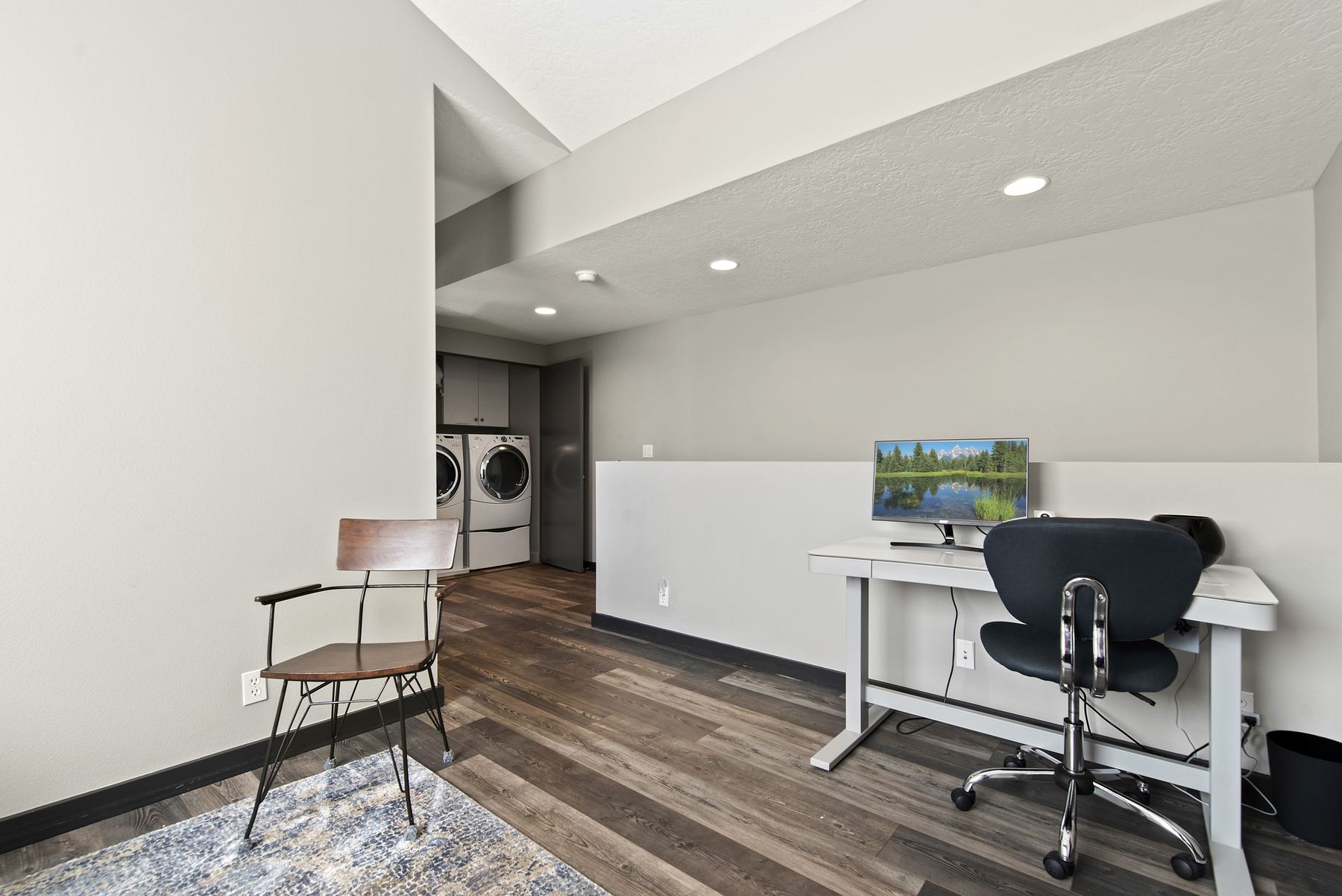 Dedicated workspace with desk and monitor at a Boise vacation rental with fast internet